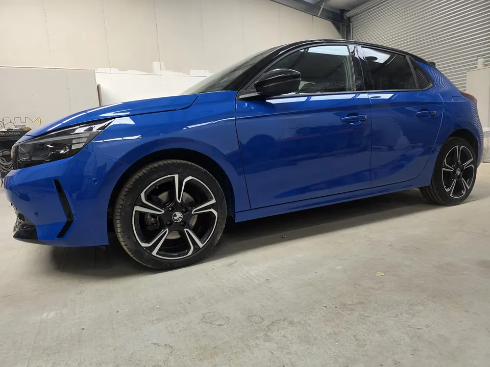 Blue car repaired - passenger side, after repair